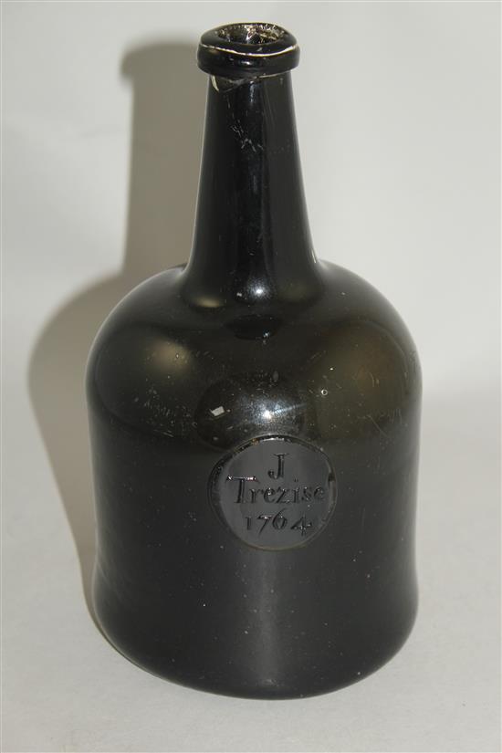 A George III sealed mallet shaped wine bottle, J.Trezise, 1764, 22cm